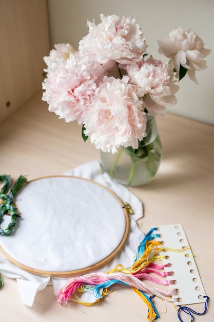 embroidered floral hoop on linen