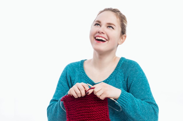 happy student holding embroidered hoop